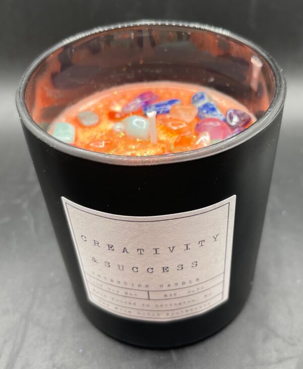 creativity success candle